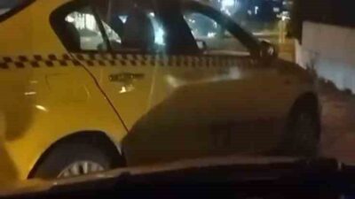 Esenyurt’ta akşam saatlerinde telefonla konuşmak için aracını park eden taksi